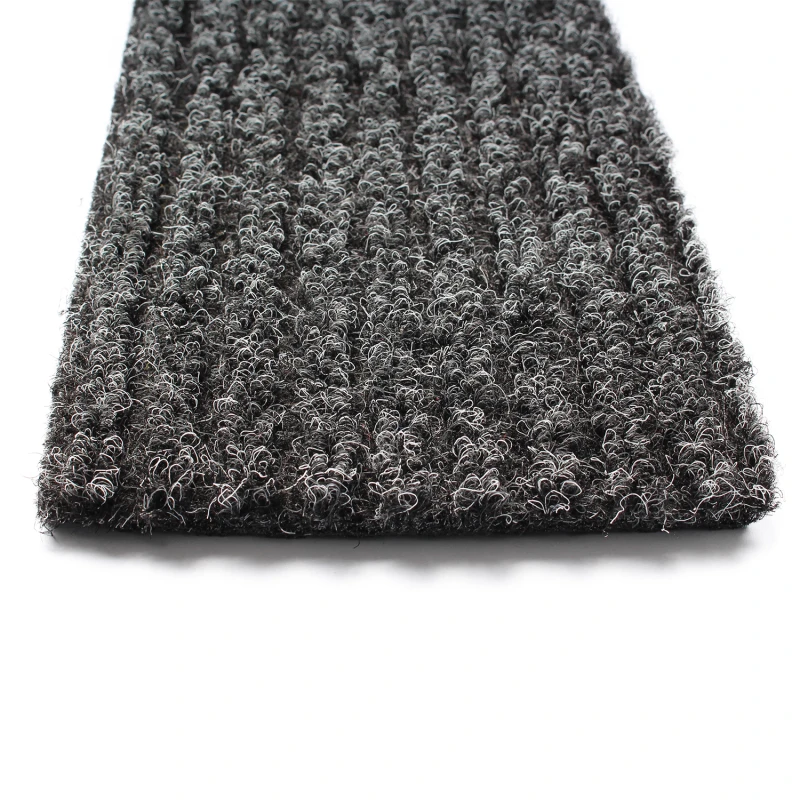 Detailfoto van de bovenzijde van een antraciet grijze schoonloopmat.