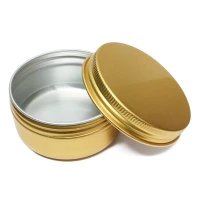 Goud blikje met open schroefdeksel