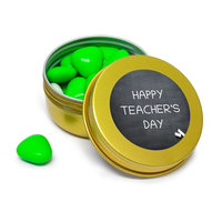 Goud blikje met groene snoepjes met de tekst happy teachers day
