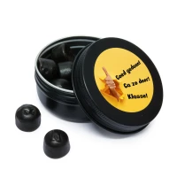 Zwart blikje als bedankje voor complimentendag met drop snoepjes en gele bedrukte sticker