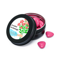 Zwart blikje met fuchsia roze snoepjes en sticker met de tekst jij verdient een bloemetje bedankje voor secretaressedag