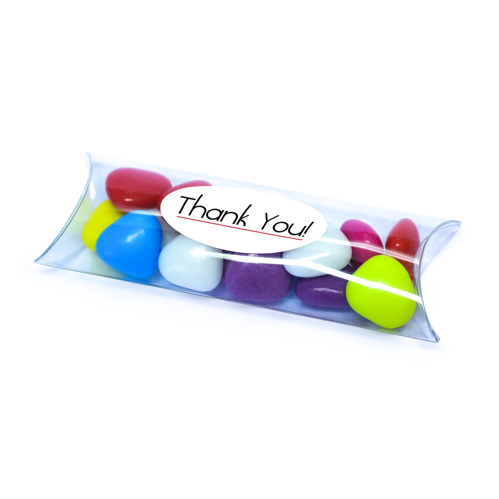 Doorzichtig bedankje met tube en gekleurde snoepjes en bedankt sticker